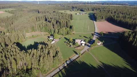 Aerial Flight Over Forest and Rural Countryside Toward the Horizon Stock Footage 345003343