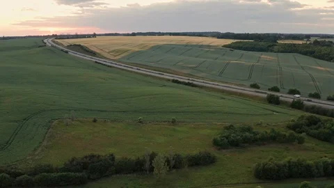 Aerial flight over green fields and meadows in Germany 스톡 동영상 116630573