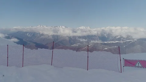 Aerial flight over grid in ski resort Stock Footage 103474579