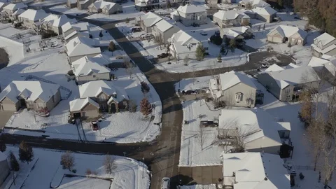 Aerial flight over houses after snow Stock Footage 111663309