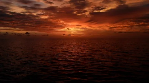 Aerial Flight over Impressive Red Sunset at the Sea Stock Footage 93722754