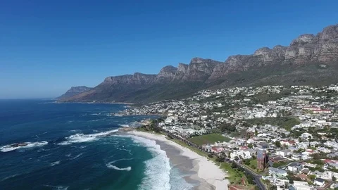 Aerial flight over large bay and a small city 4k Stock Footage 73429677