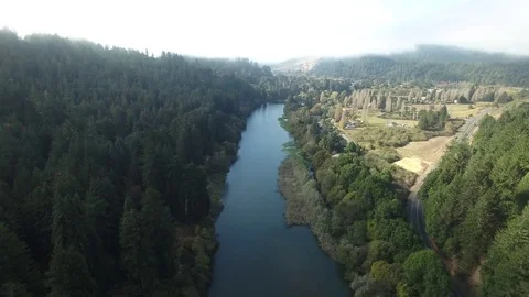 Aerial Flight Over A Lazy Mountain River Stock Footage 81649149