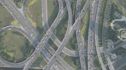 Aerial flight over massive junction intersection in Zhengzhou, urban China Stock Footage 65885533