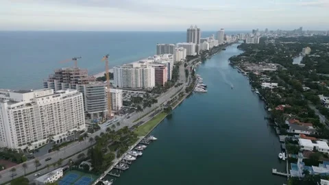 Aerial flight over miami beach waterway Stock Footage 346263567