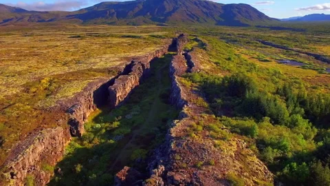 Aerial flight over the Mid Atlantic Ridge in Iceland's Thingvellir National Park Vídeos de archivo 330284975