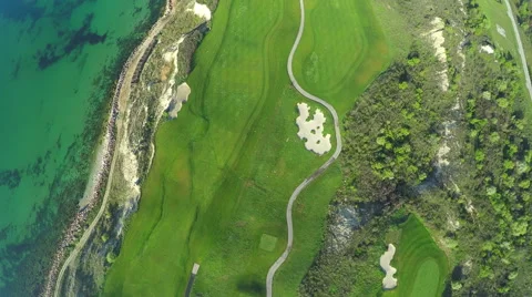 Aerial, Flight over modern golf resort close to sea coast Stock-Footage 62479900