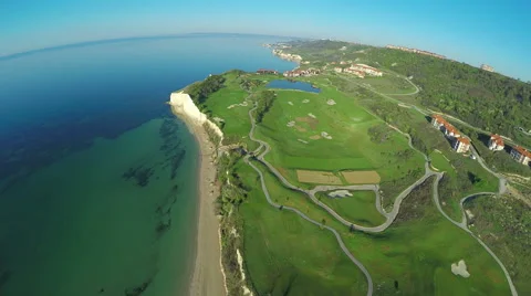 Aerial, Flight over modern golf resort close to sea coast Video stock 62480060