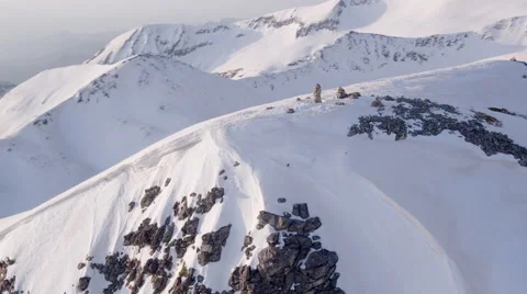 Aerial Flight Over Mountain Peak Epic Winter Vacation Landscape Vídeo Stock 63604510