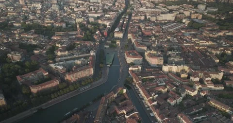 Aerial Flight Over Navigli with Camera Tilt Down to Milan Streets Vídeo Stock 344470025