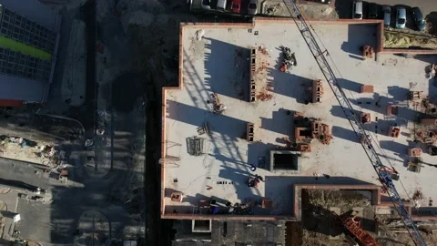 Aerial Flight Over a New Constructions Development Site with High Tower Cranes Stock Footage 167891167