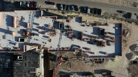 Aerial Flight Over a New Constructions Development Site with High Tower Cranes Stock Footage 167891917