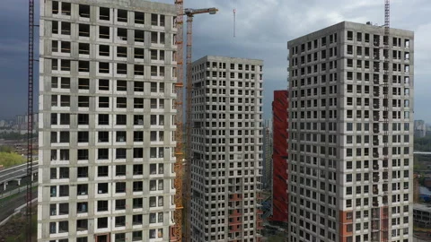 Aerial Flight Over a New Constructions Development Site. Urban Construction Site Stock Footage 193065939