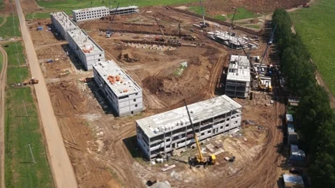 Aerial Flight Over a New Constructions Development Site 스톡 동영상 196117348