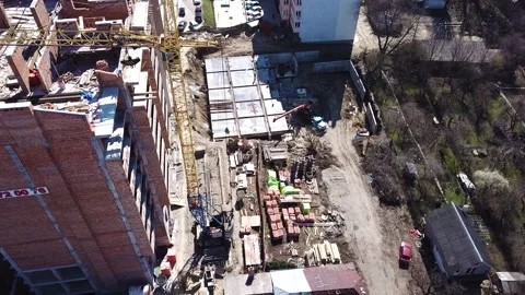 Aerial Flight Over a New Constructions Development Site with Diverse Heavy Stock Footage 231088783