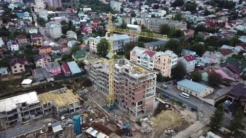 Aerial Flight Over a New Constructions Development Site with Diverse Heavy Stock Footage 231456290