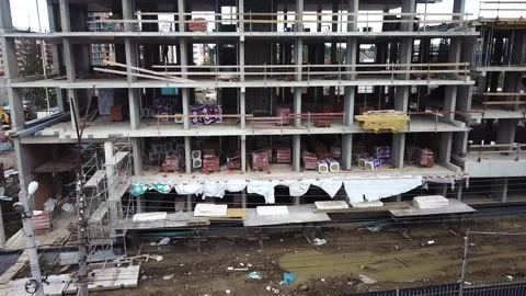 Aerial Flight Over a New Constructions Development Site with Diverse Heavy Stock Footage 232084563