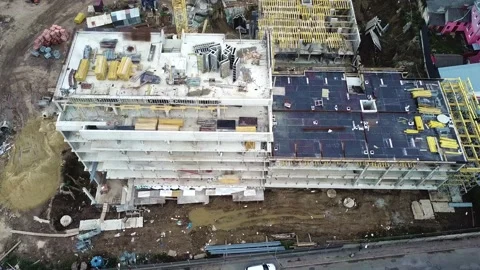 Aerial Flight Over a New Constructions Development Site with Diverse Heavy Stock Footage 232742983