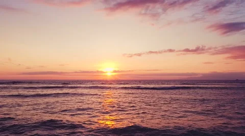 Aerial Flight Over Ocean into Dramatic and Vibrant Hawaiian Sunset Stock Footage 56585091