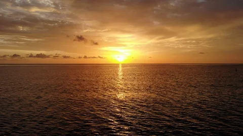 Aerial Flight over Ocean Waves with Impressive Sunset at the Sea Stock Footage 93719497
