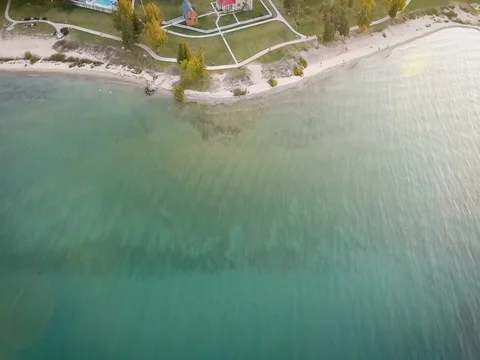 Aerial flight over Old Mackinac Point Lighthouse Stock Footage 80895551