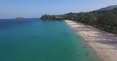 Aerial flight over a perfect beach turqoise ocean Stock Footage 61120893