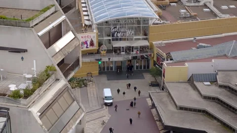 Aerial Flight Over Polygon Shopping Mall and Pedestrian Entrance in Montpellier Видео 344443531