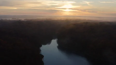 Aerial flight over a river during fall 스톡 동영상 111649998