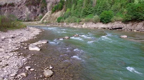 Aerial: flight over river rapids Stock Footage 55370368