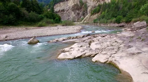 Aerial: flight over river rapids Stock Footage 55376832