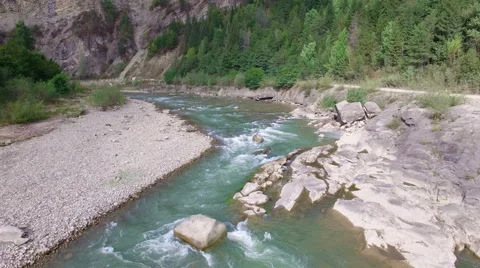 Aerial: flight over river rapids Stock Footage 55433770