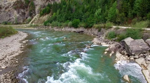 Aerial: flight over river rapids Stock Footage 55441693