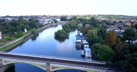 Aerial flight over river Thames London, between Richmond &amp; Twickenham  Stock Footage 80295551