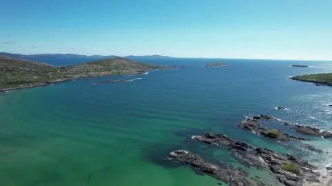 Aerial flight over rocky coast out to the Atlantic, Derrynane, Ireland Stock Footage 346745902