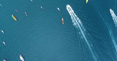 Aerial flight over sea with multiple boats 動画素材 72138501