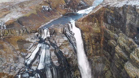 Aerial flight over secret waterfall in Iceland Stock Footage