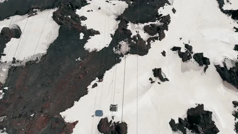 Aerial flight over side of the mountain and riding the funicular by cable car Stock Footage 169036860