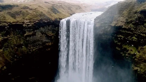 Aerial flight over Skogar waterfall, Iceland Stock Footage
