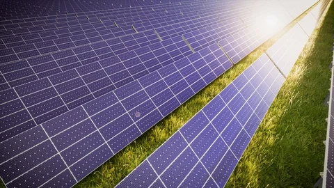 Aerial Flight Over Solar Panel Farm At Green Energy 動画素材 128695247