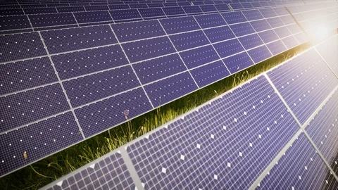 Aerial Flight Over Solar Panel Farm At Green Energy 動画素材 128704617