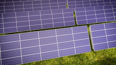 Aerial Flight Over Solar Panel Farm At Green Energy 動画素材 128707238