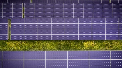 Aerial Flight Over Solar Panel Farm At Green Energy 動画素材 128725377