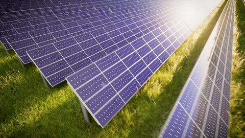 Aerial Flight Over Solar Panel Farm At Green Energy 動画素材 128805875