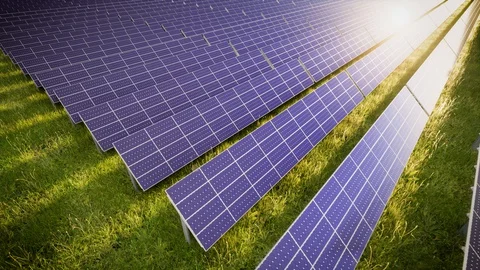 Aerial Flight Over Solar Panel Farm At Green Energy 動画素材 128808370