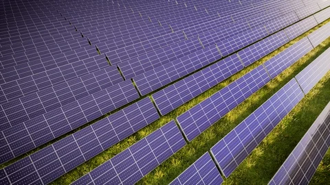 Aerial Flight Over Solar Panel Farm At Green Energy 動画素材 128845143