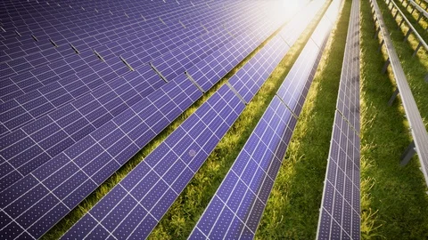 Aerial Flight Over Solar Panel Farm At Green Energy 動画素材 128928910
