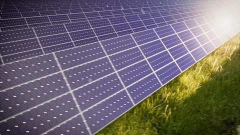 Aerial Flight Over Solar Panel Farm At Green Energy 動画素材 128981307