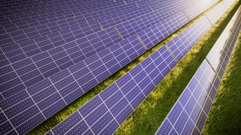 Aerial Flight Over Solar Panel Farm At Green Energy 動画素材 128989839