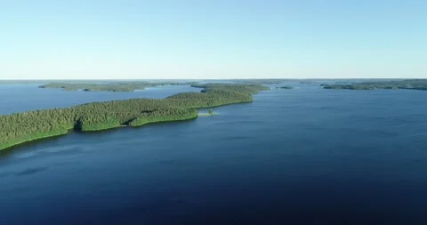 Aerial flight over summer forest and islands Stock Footage 147935569