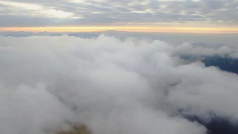 Aerial Flight Over Sunset Cloud Inversion In Mountains Video stock 79697416